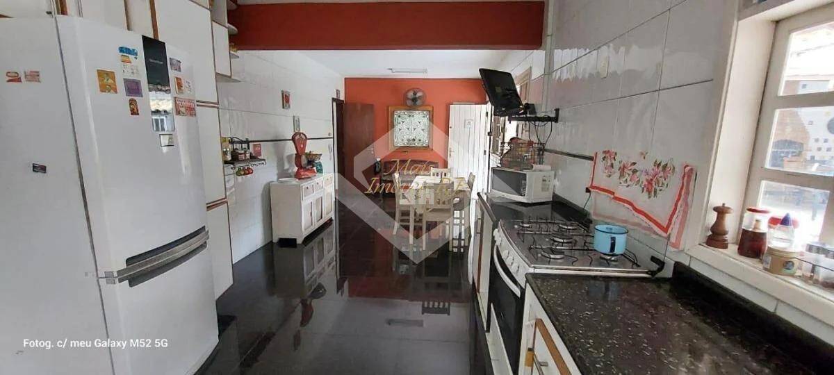 Casa à venda com 4 quartos, 329m² - Foto 6